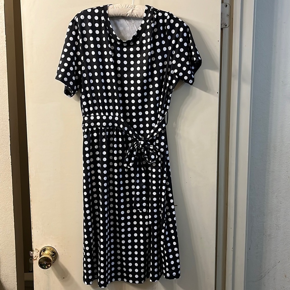 NWT Medium black w/white polka dots short sleeved. Wraparound dress